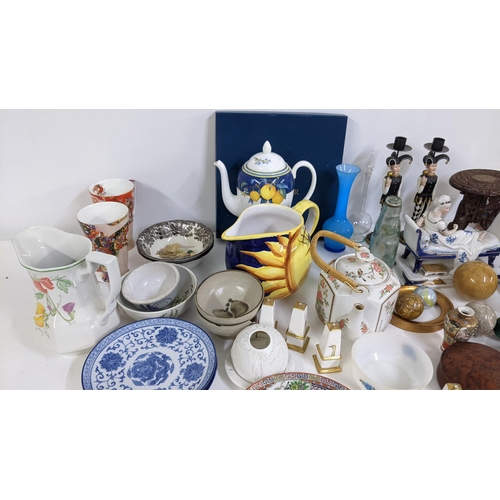 98 - A mixed lot to include figural candlesticks, Chinese plate, paperweight and other items Location:LWB