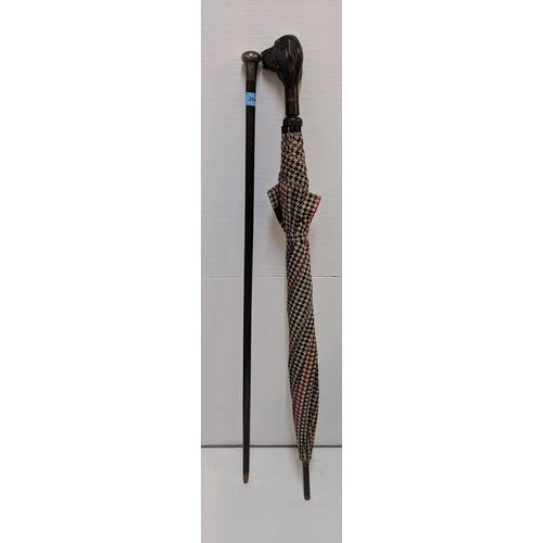 264 - A silver topped walking stick and an umbrella with a dog head handle, Aramis, Location:A2F