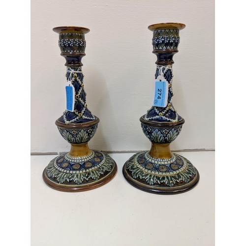 274 - A pair of late 19th/early 20th century Royal Doulton Lambeth candlesticks with artist's monogram to ... 