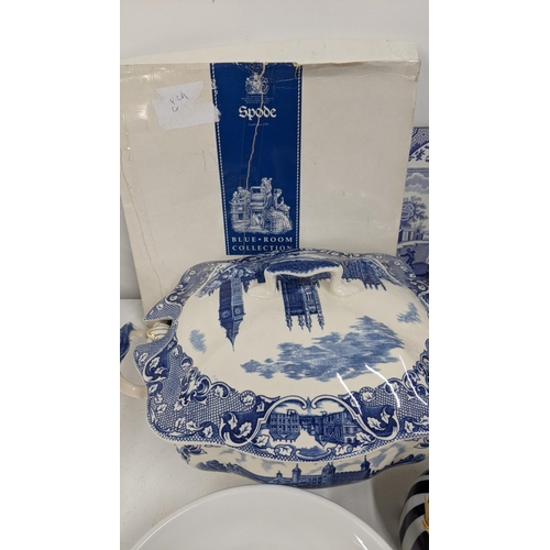 288 - A mixed lot of mostly blue and white ceramics to include two blue and white vases, blue and white li... 