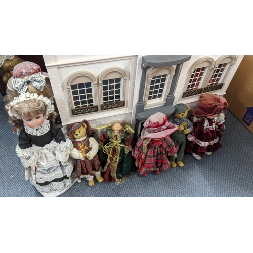 290 - A dolls house with mixed furniture, together with a collection of dolls, Location:A2F