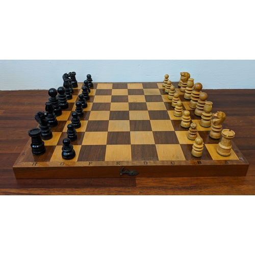 316 - A wooden chess set with pieces, LocationA4B