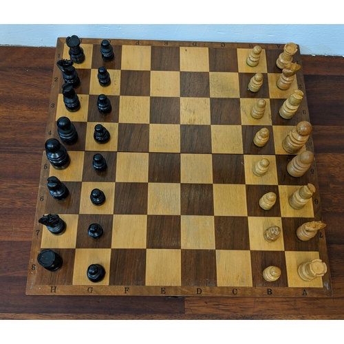 316 - A wooden chess set with pieces, LocationA4B