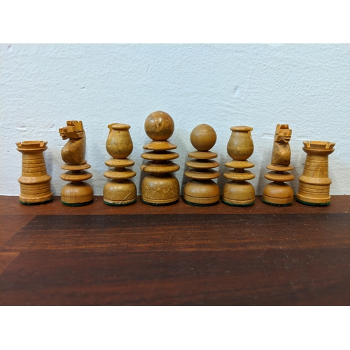 316 - A wooden chess set with pieces, LocationA4B