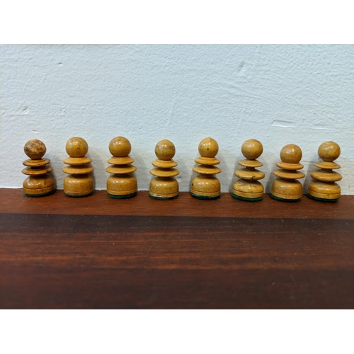 316 - A wooden chess set with pieces, LocationA4B