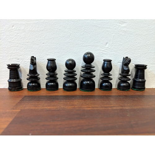 316 - A wooden chess set with pieces, LocationA4B