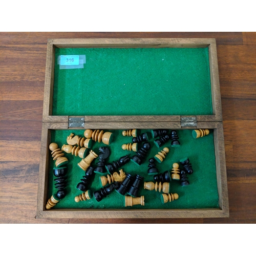 316 - A wooden chess set with pieces, LocationA4B