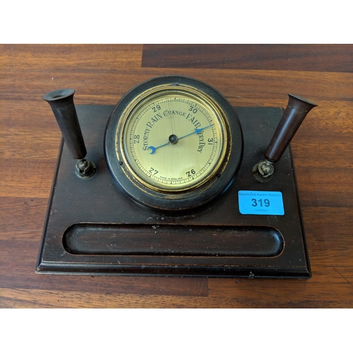 319 - An early 20th century desk barometer with pen holders and a studio bronze bowl, Location:4.2