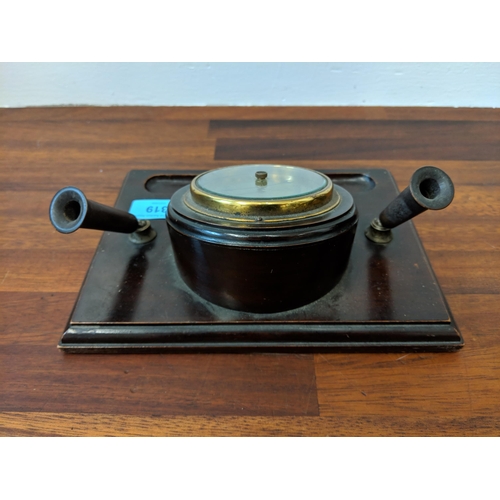 319 - An early 20th century desk barometer with pen holders and a studio bronze bowl, Location:4.2