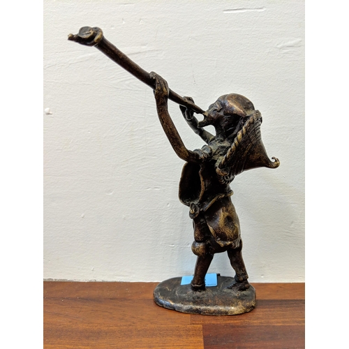 322 - A 20th century Chinese bronze figure of a Musician signed AOP-BP2351 and other indistinct text, Loca... 