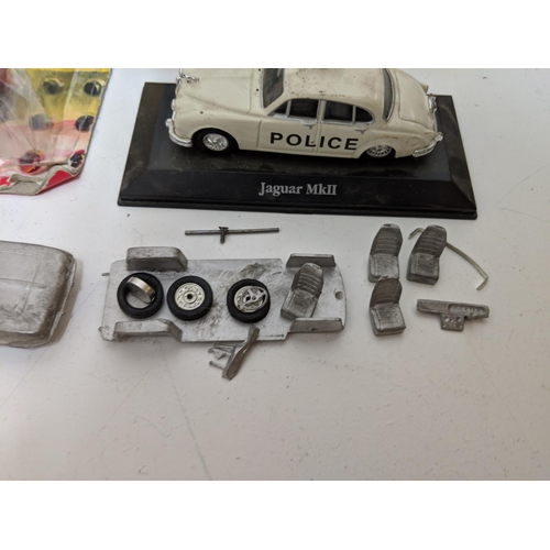 325 - Diecast and tinplate model vehicles to include Grand Tourism Reliant Scmiter, Corgi 155, Matchbox Y1... 