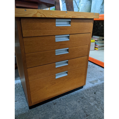 339 - A teak twin pedestal desk with later pine top, each pedestal with five graduated drawers, the loose ... 