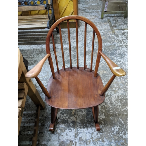 353 - An adapted child's Ercol rocking chair with detachable cushion seat and back Location: G