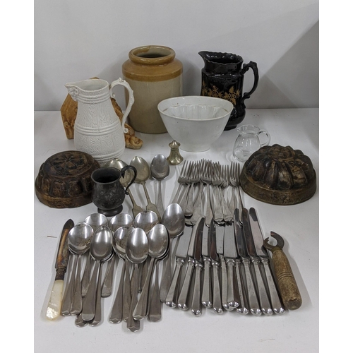 368 - A mixed lot to include cutlery and flatware together with a pewter cup, Victorian jelly moulds, wall... 