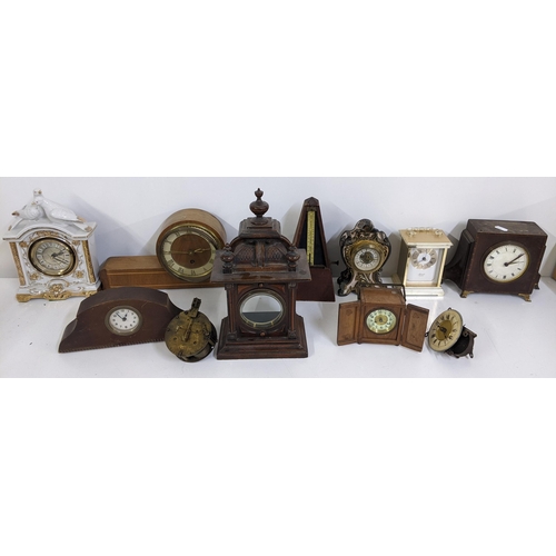 371 - Mixed clocks and a metronome to include a mid 20th century Timemaster mantle clock, Hermle carriage ... 