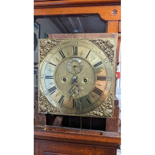 378 - An 18th century 8-day oak cased longcase clock having a brass dial with subsidiary seconds, dial, da... 