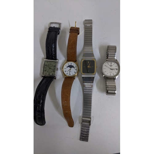 387 - A Seiko quartz gold plated watch with moon phase, together with an Armani watch, a Seiko and a Pulsa... 