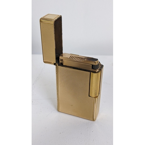 394 - A boxed DuPont gold plated lighter, together with original paperwork and lighter fluid, Location:T