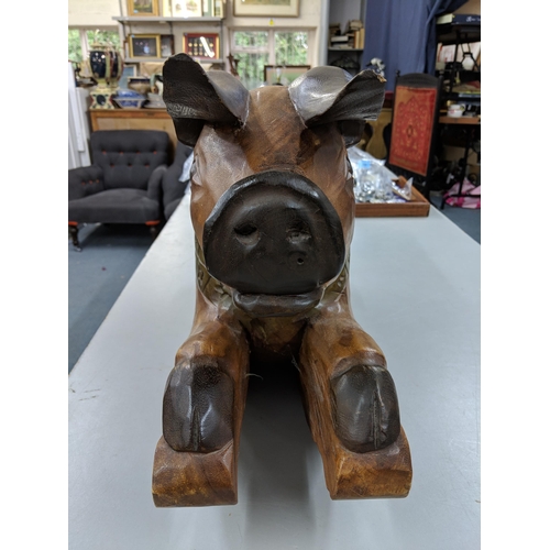 400 - A hardwood rocking seat fashioned as a pig, Location:RAB