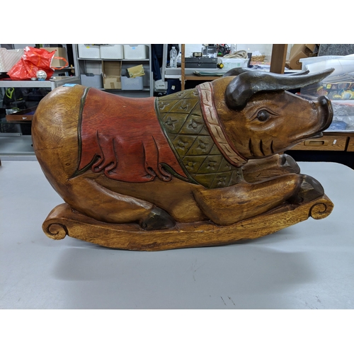 400 - A hardwood rocking seat fashioned as a pig, Location:RAB