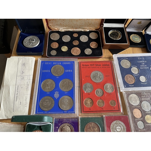 402 - A collection of coins and medals, together with share certificates, stamps, and some reproduction co... 