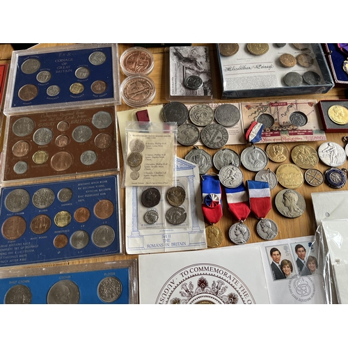 402 - A collection of coins and medals, together with share certificates, stamps, and some reproduction co... 