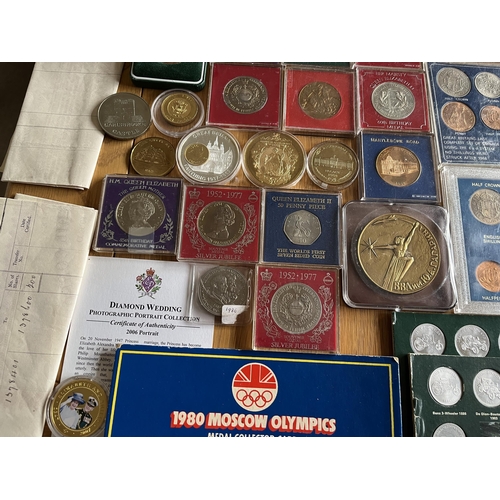 402 - A collection of coins and medals, together with share certificates, stamps, and some reproduction co... 