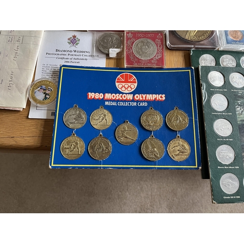 402 - A collection of coins and medals, together with share certificates, stamps, and some reproduction co... 