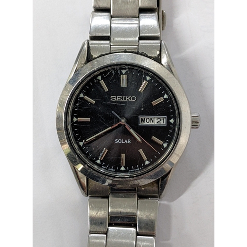 406 - A Seiko gents day/date stainless steel wristwatch, Location:T