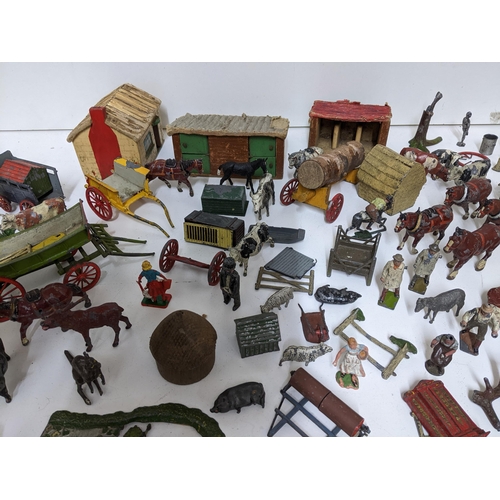 418 - A quantity of Britain's and other hollow lead cast farmyard animals and figures, wild animals, horse... 