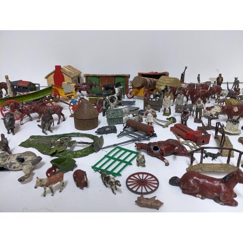 418 - A quantity of Britain's and other hollow lead cast farmyard animals and figures, wild animals, horse... 