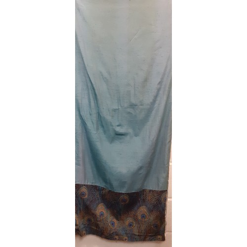 135 - Liberty-A pair of teal curtains having a panel to the hem of Liberty turquoise and blue 'Hera Feathe... 