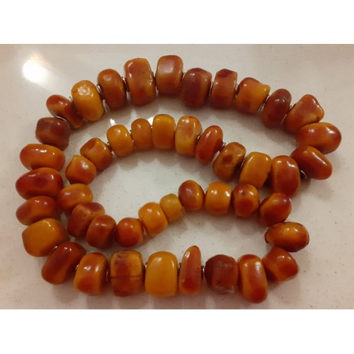 139 - A vintage bakelite necklace having 46 irregular beads measuring 100cm in length in total. Location: ... 