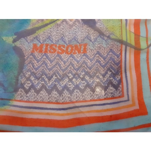 21 - Missoni-A vintage sheer silk scarf having a multi-coloured striped border enclosing images of large ... 