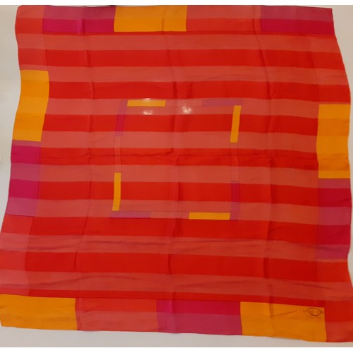 42 - A group of vintage silk scarves to include a Pierre Balmain of Paris turquoise, orange, red and gold... 