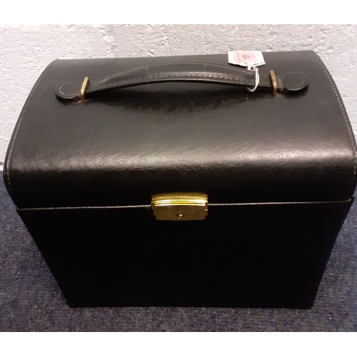 151 - A modern black casket jewellery chest and contents to include an engraved rolled gold bangle with sa... 