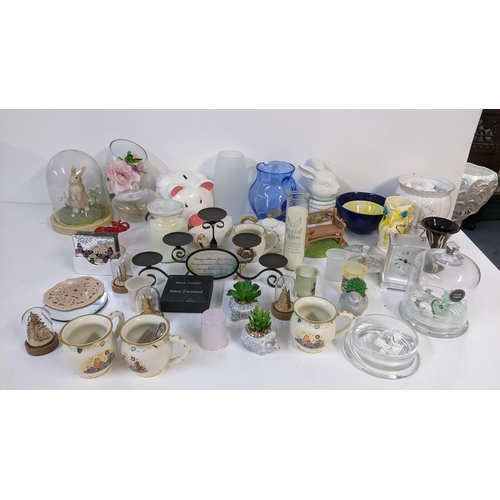 172 - A mixed lot to include Swarovski style ornaments, Heirloom porcelain music box, Neostar fan, Hornsea... 