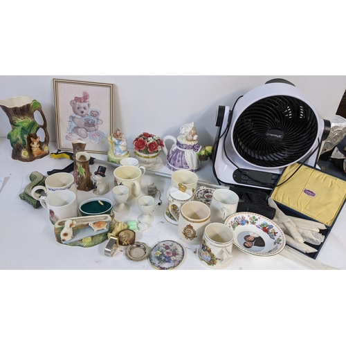 172 - A mixed lot to include Swarovski style ornaments, Heirloom porcelain music box, Neostar fan, Hornsea... 