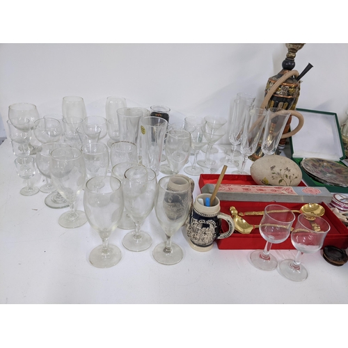 275 - A mixed lot to include two canteens of cutlery, hookah shisha, glassware, mixed treen and other item... 