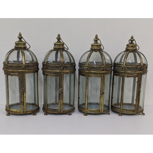 282 - A set of four brass finish classical style hexagonal dome lanterns on four claw feet Location:11.4