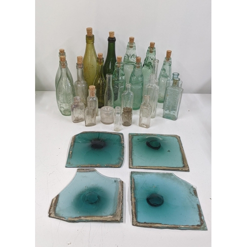 283 - Four 18th century glass window panes A/F, together with vintage glass bottles Location:8.3