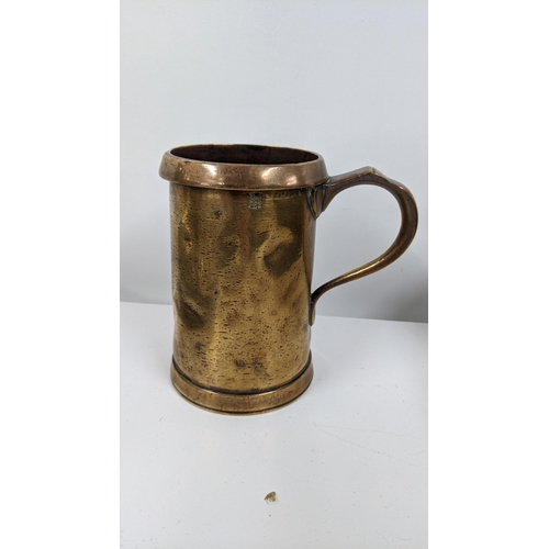 284 - 18th century and later pewter ware, together with a 19th century brass tankard and other items Locat... 