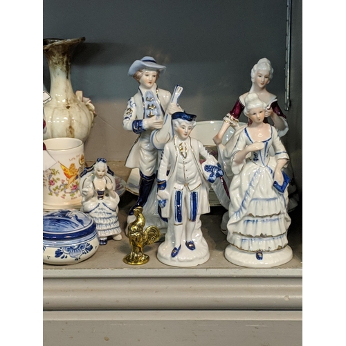 295 - Ceramics and glassware to include mid 20th century porcelain figures, Capodimonte style figures, Vic... 