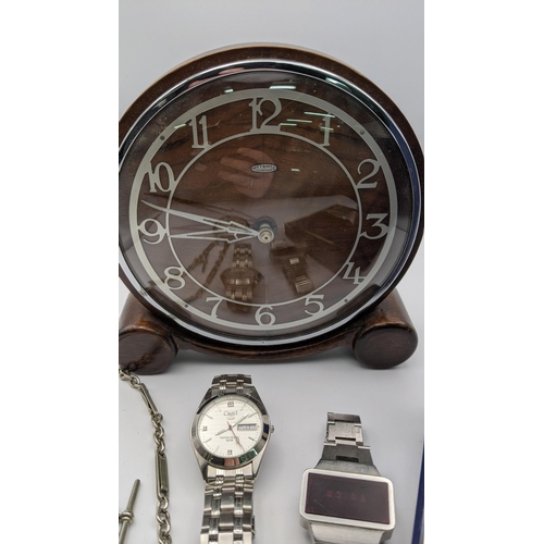 311 - Mixed watches to include a Seiko quartz gents wristwatch and others together with a Metamec wooden c... 