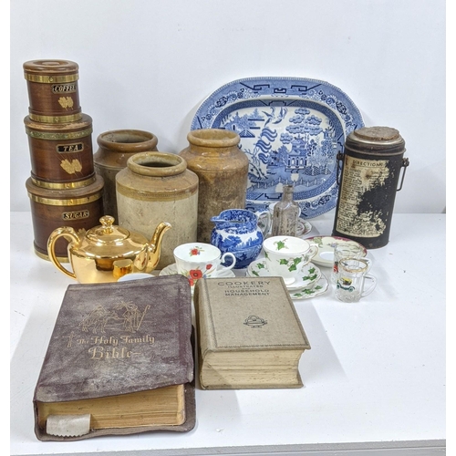 312 - A mixed lot to include a WWII Thermos flask, vintage sugar, tea and coffee pot, mixed ceramics to in... 