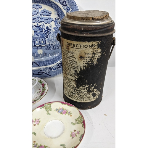 312 - A mixed lot to include a WWII Thermos flask, vintage sugar, tea and coffee pot, mixed ceramics to in... 