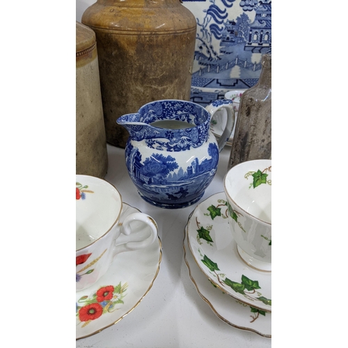 312 - A mixed lot to include a WWII Thermos flask, vintage sugar, tea and coffee pot, mixed ceramics to in... 