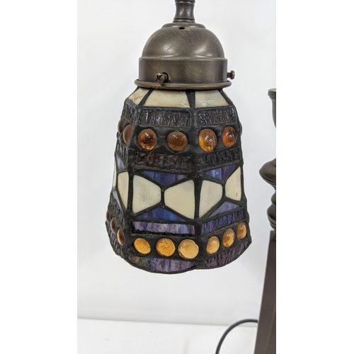 313 - A Tiffany style table lamp A/F with coloured glass shade, on a turned base
Location:ROS