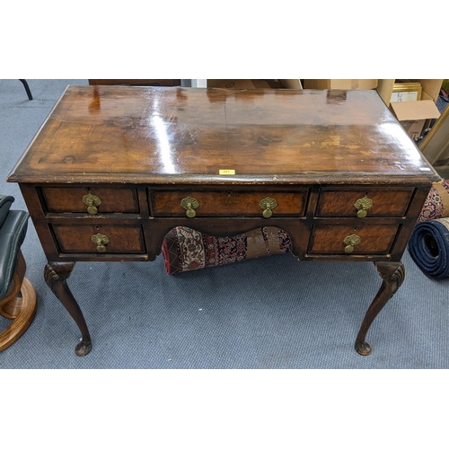 321 - An early 20th century Queen Anne style walnut veneered desk , 77cm h x 106cm w, and a matching stool... 