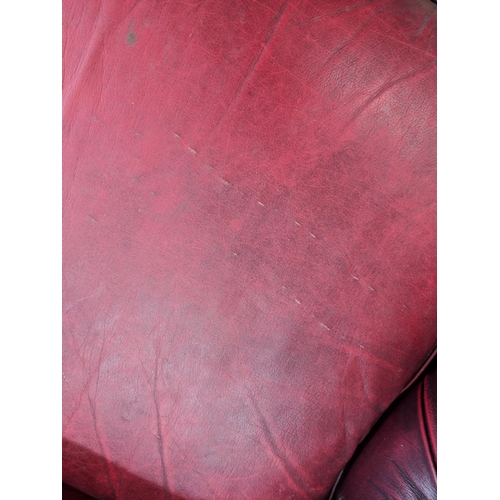 202 - One Chesterfield red leather two-seater sofa Location:RAF